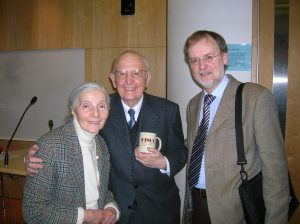 Founding member, Larry Hurtado, presents an official EHCC mug to Professor Martin Hengel (seen here with his wife)